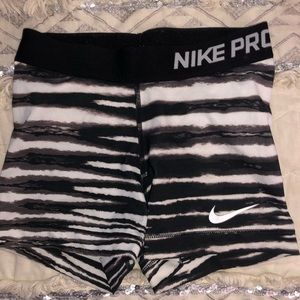 Black & white striped Nike Pros